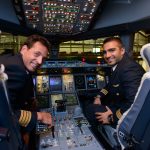Image of commercial airline pilots in the cockpit