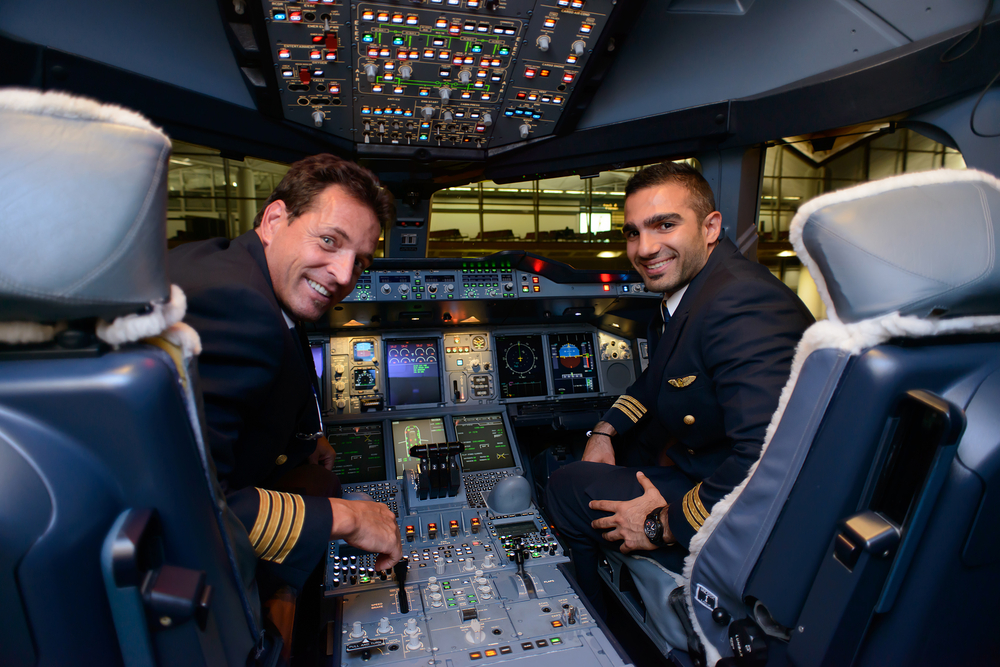 Image of commercial airline pilots in the cockpit