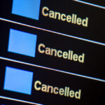 Pilot shortage image showing Canceled flight status showing on monitor