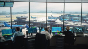 Image of air traffic control in the tower directing air traffic in class B airspace.
